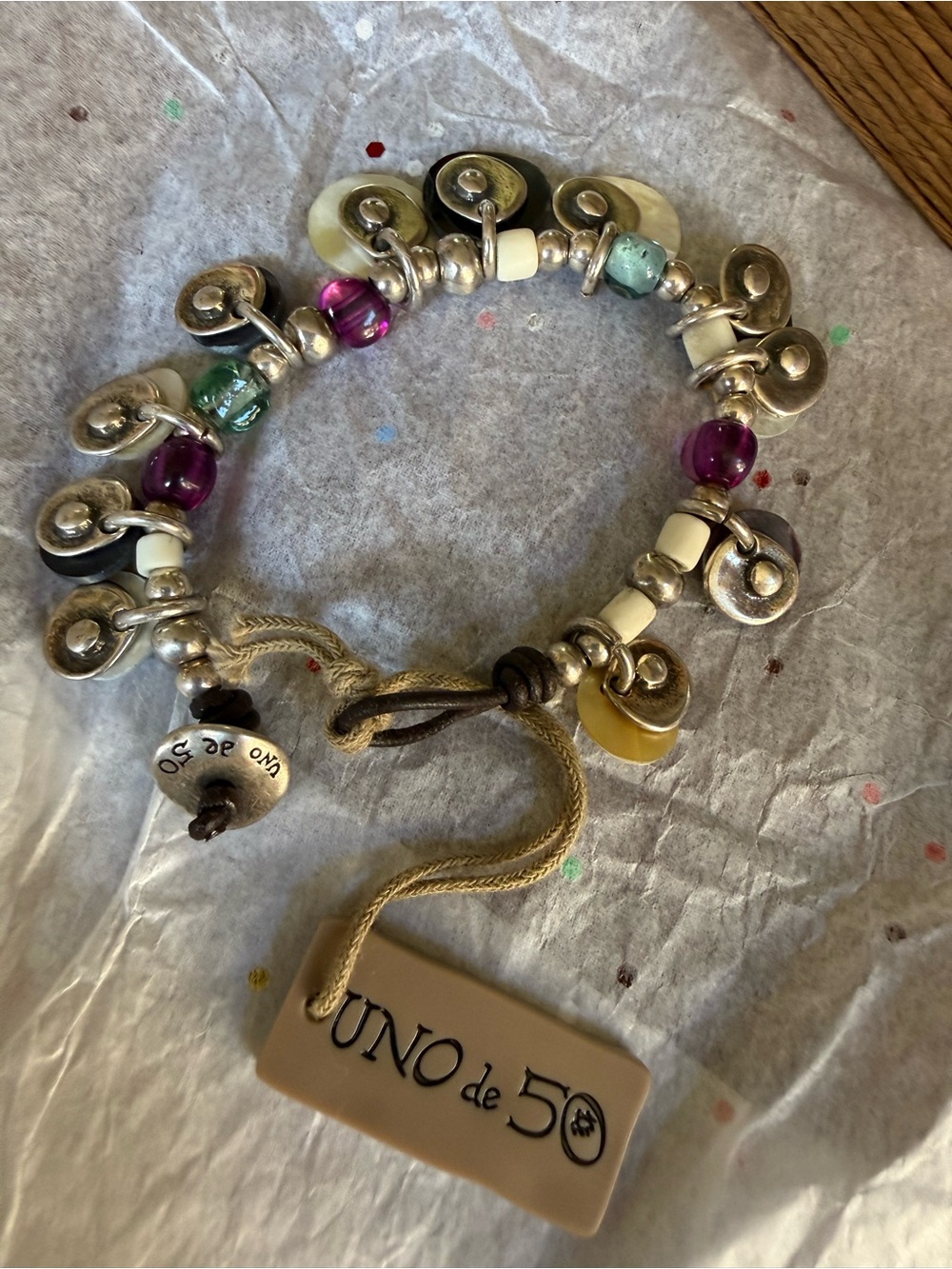 UNO de 50 Multicolor Bead and Disc Charm Bracelet — Purple, Teal, Cream, Yellow